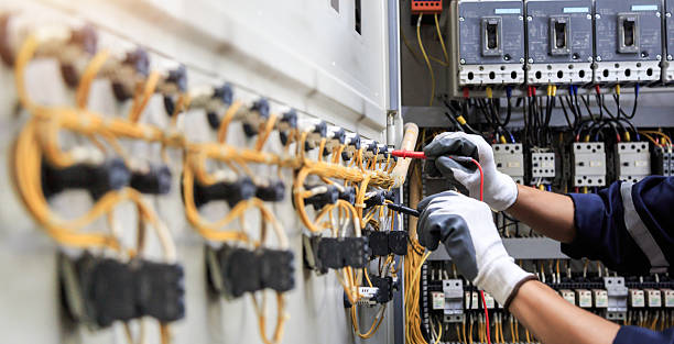 Professional Electrician technician working in Mooreville, MS
